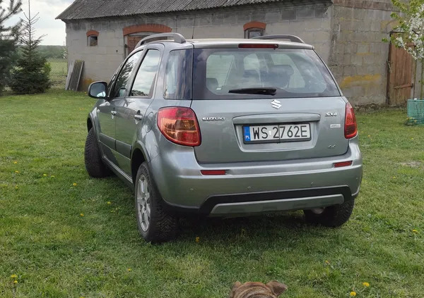 suzuki Suzuki SX4 cena 34500 przebieg: 135140, rok produkcji 2013 z Szczecinek